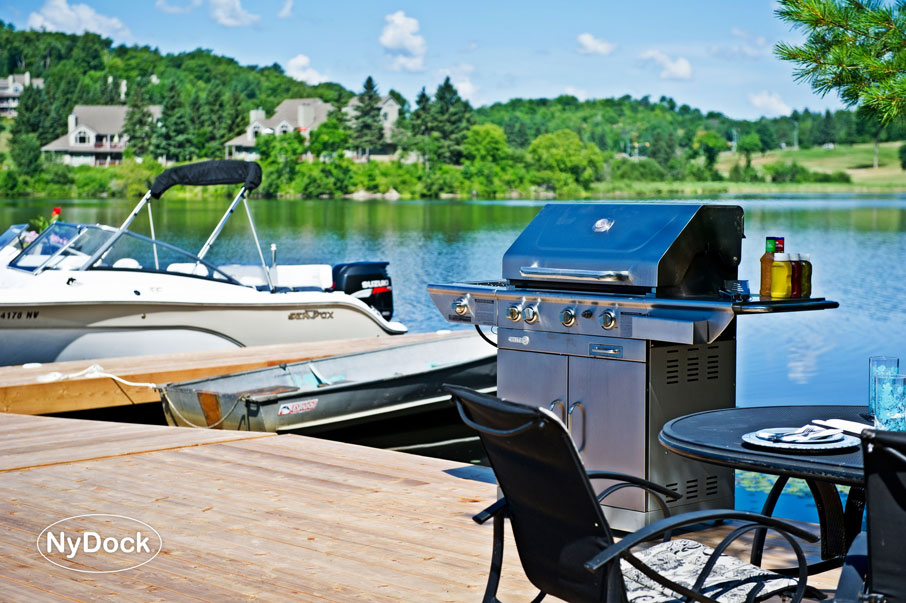 Boats and a barbecue on a NyDock floating dock