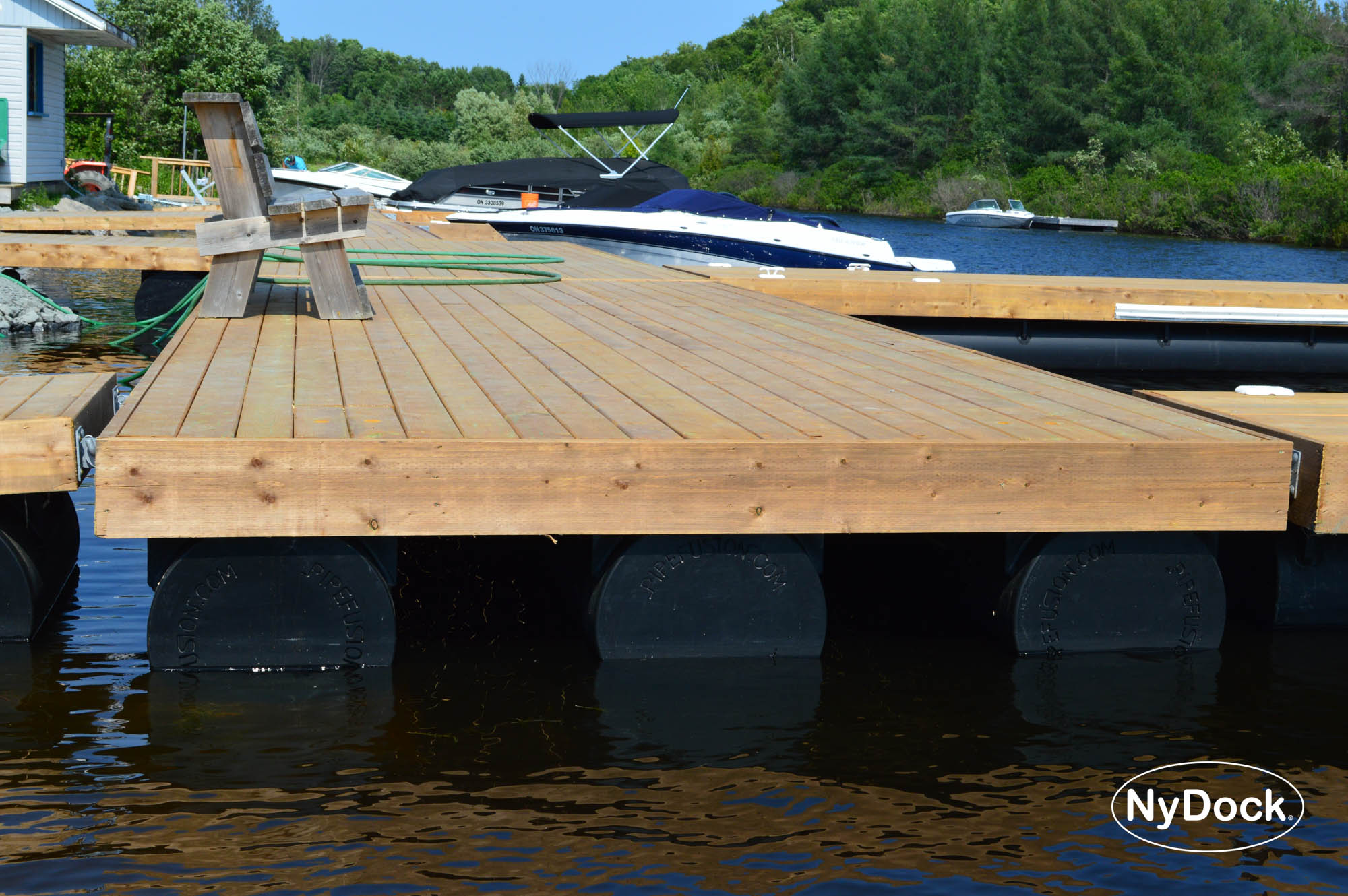 Photo showing NyDock HDPE pontoons and hinge attachments