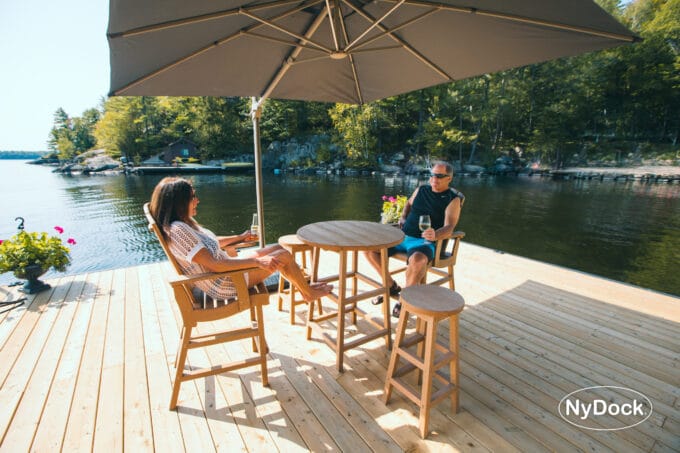 Couple enjoying a drink on their NyDock floating dock