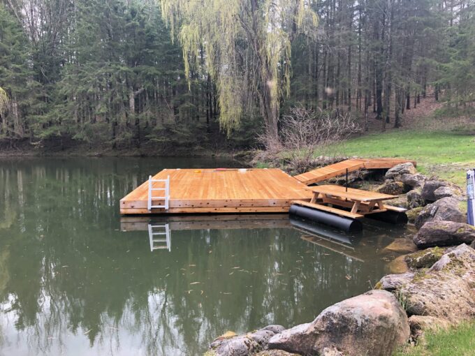 NyDock floating dock installed on a pond.